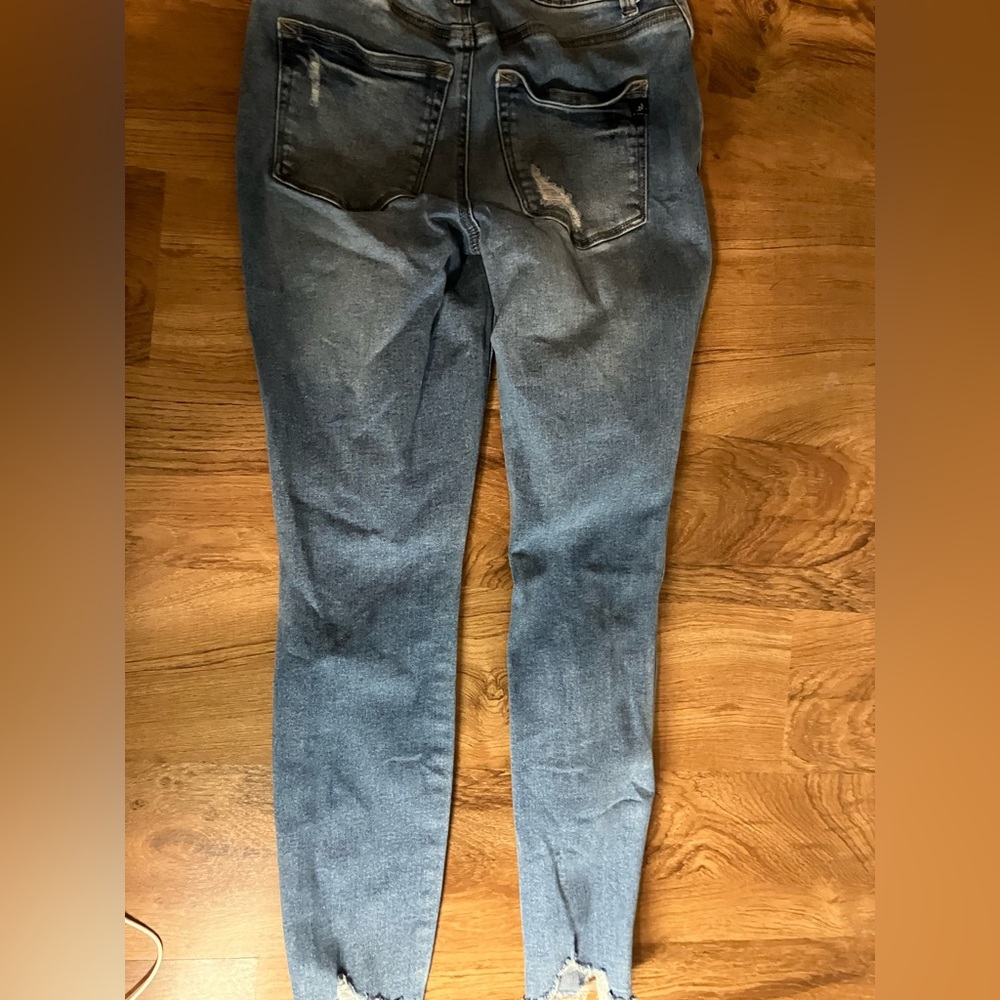 Multi button high rise skinny jeans